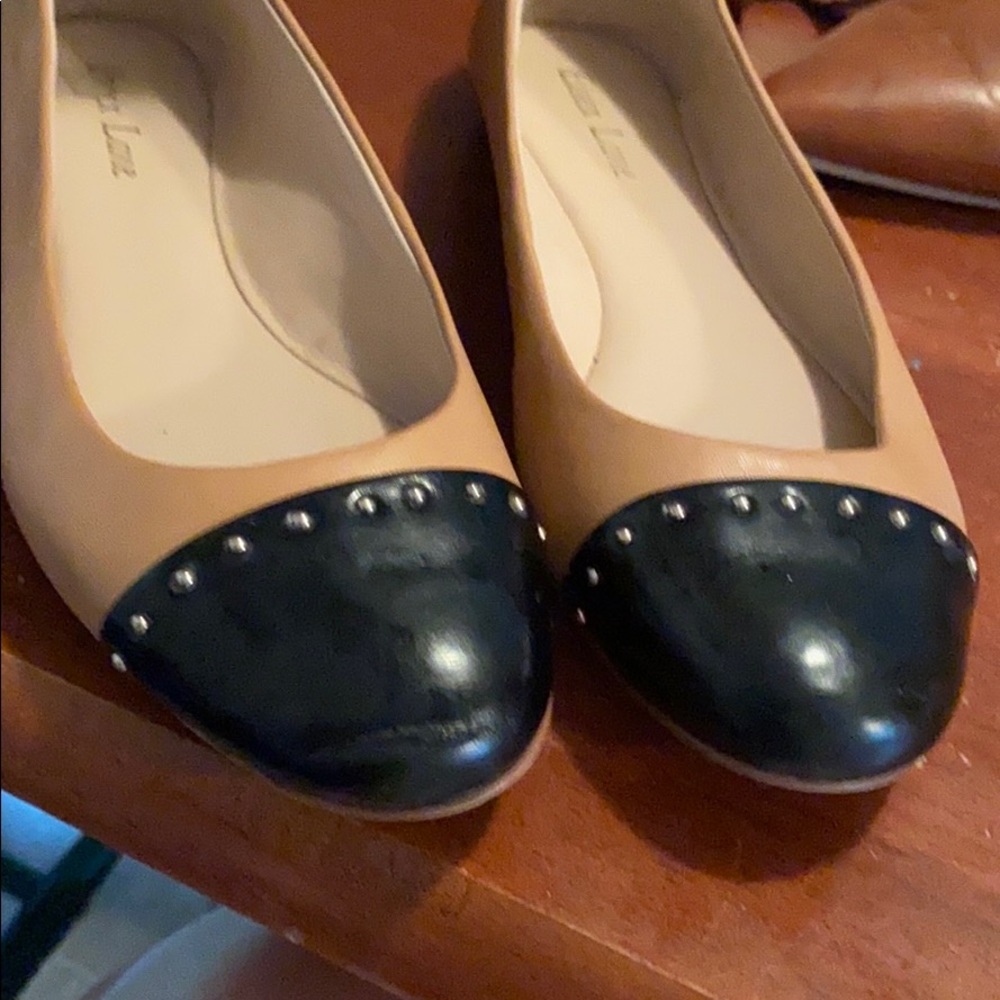 Brown and black flats with studs